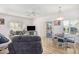 Bright living room featuring wood-look floors, lots of natural light and a comfortable seating arrangement at 14000 N 94Th N St # 1129, Scottsdale, AZ 85260