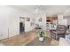 Inviting living space with wood-look floors, a dining area, and direct access to the outdoor patio at 14000 N 94Th N St # 1129, Scottsdale, AZ 85260