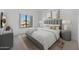 Comfortable bedroom featuring a large window, stylish decor, and a plush bed for a restful ambiance at 14000 N 94Th St # 3198, Scottsdale, AZ 85260
