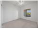 Cozy bedroom with a window view, neutral carpet, and ample natural light for a calming atmosphere at 14000 N 94Th St # 3198, Scottsdale, AZ 85260