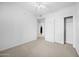 Spacious bedroom featuring neutral tones, double doors, and a closet, with easy access to other rooms at 14000 N 94Th St # 3198, Scottsdale, AZ 85260