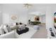 Open-concept living area with a dining space, neutral decor, and a ceiling fan enhancing the interior at 14000 N 94Th St # 3198, Scottsdale, AZ 85260