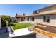 This backyard has an entertainment area, dining area and garden boxes; perfect for any Gathering's outdoor activities at 14235 N 26Th Ln, Phoenix, AZ 85023