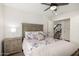 Bedroom with natural light, neutral carpet and access to the stairs at 14235 N 26Th Ln, Phoenix, AZ 85023