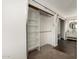 Walk-in closet with custom shelving and rod, featuring carpeted floors at 14235 N 26Th Ln, Phoenix, AZ 85023