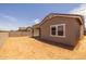 The backyard features a patio and is fully enclosed with a block wall at 15634 W Georgia Dr, Surprise, AZ 85379