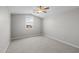 Bright bedroom with a large window and neutral decor at 15634 W Georgia Dr, Surprise, AZ 85379