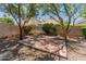 Backyard view with patio and block fence at 1606 N Apache Dr, Chandler, AZ 85244