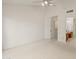 Spacious bedroom featuring neutral carpeting and adjoined bathroom at 1606 N Apache Dr, Chandler, AZ 85244