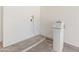White water softener in garage at 1606 N Apache Dr, Chandler, AZ 85244