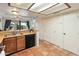 Kitchen featuring wood cabinets, stainless appliances, and tile floor at 1606 N Apache Dr, Chandler, AZ 85244