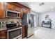 Bright kitchen with ample cabinetry and modern stainless-steel appliances at 16602 N 66Th St, Scottsdale, AZ 85254