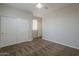 Bedroom featuring a sliding closet, carpeted floors, and easy access to the hallway at 1826 W Oriole Way, Chandler, AZ 85286