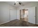 Bedroom featuring sliding closet, carpeted floors, and easy access to the hallway at 1826 W Oriole Way, Chandler, AZ 85286