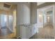Bright hallway with wood-look tile, built in storage and convenient access to other living spaces at 1826 W Oriole Way, Chandler, AZ 85286