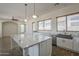 Large kitchen with a spacious island and stainless steel appliances at 1826 W Oriole Way, Chandler, AZ 85286