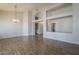 Open floor plan showcasing modern arches, wood-look floors, and neutral paint at 1826 W Oriole Way, Chandler, AZ 85286