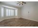 Bright main bedroom featuring large windows with plantation shutters at 1826 W Oriole Way, Chandler, AZ 85286