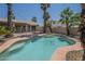 Inviting backyard pool with desert landscaping and string lights, perfect for relaxation and entertaining at 1826 W Oriole Way, Chandler, AZ 85286