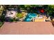 Aerial view of private pool, covered patio, and red tile roof at 18402 E Oak Hill Ln, Queen Creek, AZ 85142