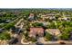 Overhead view of a home with a tile roof and well-maintained landscaping within a mature residential community at 18402 E Oak Hill Ln, Queen Creek, AZ 85142