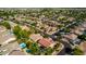 Neighborhood aerial view showing a community with mature landscaping, diverse architecture, and well-maintained streets at 18402 E Oak Hill Ln, Queen Creek, AZ 85142