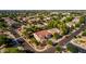 Aerial view of a well-maintained home with lush landscaping in a quiet neighborhood at 18402 E Oak Hill Ln, Queen Creek, AZ 85142