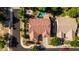 Aerial view of home with landscaped yard, pool, and patio at 18402 E Oak Hill Ln, Queen Creek, AZ 85142