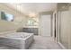 A luxurious bathroom featuring a soaking tub and a glass enclosed shower with natural light at 18402 E Oak Hill Ln, Queen Creek, AZ 85142