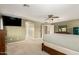 Large bedroom featuring neutral walls, carpeted floors, and a ceiling fan at 18402 E Oak Hill Ln, Queen Creek, AZ 85142