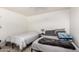 Cozy bedroom featuring two comfortable beds and neutral decor at 18402 E Oak Hill Ln, Queen Creek, AZ 85142