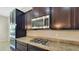Well-equipped kitchen featuring stainless steel appliances and a gas cooktop at 18617 W Williams St, Goodyear, AZ 85338