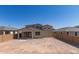 Spacious backyard features a covered patio, ideal for entertaining and enjoying the outdoors at 18778 E Panchito Dr, Gold Canyon, AZ 85118