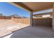 Backyard with patio cover, offering an ideal space for outdoor living and entertaining at 18778 E Panchito Dr, Gold Canyon, AZ 85118