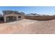 View of the spacious backyard with a covered patio, perfect for outdoor gatherings and relaxation at 18778 E Panchito Dr, Gold Canyon, AZ 85118