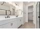 Bathroom featuring double sinks, modern fixtures, and a glass-enclosed shower at 18778 E Panchito Dr, Gold Canyon, AZ 85118