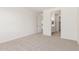 Spacious, carpeted bedroom provides natural light and doorway access to bath at 18778 E Panchito Dr, Gold Canyon, AZ 85118