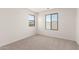 Bright bedroom with natural light and carpeted floors at 18778 E Panchito Dr, Gold Canyon, AZ 85118