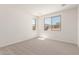 Carpeted bedroom featuring two windows with neighborhood views at 18778 E Panchito Dr, Gold Canyon, AZ 85118