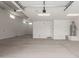 Spacious garage with high ceilings, ample lighting, and a water heater, perfect for storage and parking at 18778 E Panchito Dr, Gold Canyon, AZ 85118