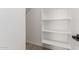 Under stairs storage area with white shelving at 18778 E Panchito Dr, Gold Canyon, AZ 85118