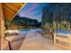 Backyard scene featuring covered patio, outdoor grill, and refreshing pool at 19275 N 88Th Way, Scottsdale, AZ 85255