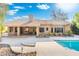 Gorgeous home featuring a pool, patio, and manicured backyard for outdoor living at 19275 N 88Th Way, Scottsdale, AZ 85255