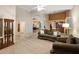 Spacious living room with vaulted ceilings, neutral carpet, and traditional decor at 19275 N 88Th Way, Scottsdale, AZ 85255