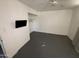 Bedroom with a closet and painted concrete floor at 2007 W Roeser Rd, Phoenix, AZ 85041