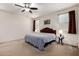 Spacious bedroom with soft carpet, neutral tones and an abundance of natural light at 2391 S 171St Ln, Goodyear, AZ 85338