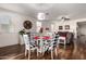 Open-concept dining area flows into living room with lots of natural light at 2391 S 171St Ln, Goodyear, AZ 85338