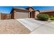 Charming single-story home with a well-maintained yard, concrete drive and a two-car garage at 2391 S 171St Ln, Goodyear, AZ 85338