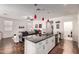 Open-concept kitchen flows into the living area, perfect for entertaining and Gathering gatherings at 2391 S 171St Ln, Goodyear, AZ 85338