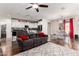 Bright and airy living room flowing into the dining area with an open floorplan at 2391 S 171St Ln, Goodyear, AZ 85338